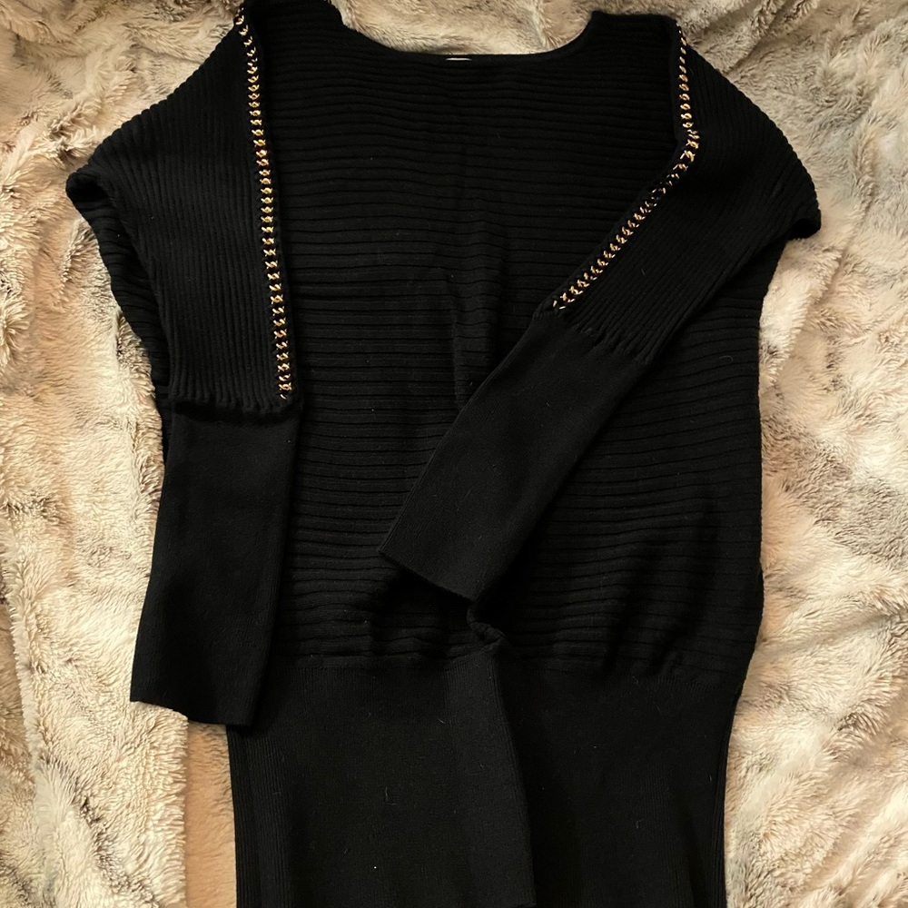 Fun Sweater with Gild Chain woven in along sleeves!